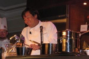 Chef Ming Tsai in mid-cooking at 2009 Aspen Food & Wine